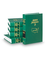 stock of green volumes of American Jurisprudence with one upright volume in front of the stack